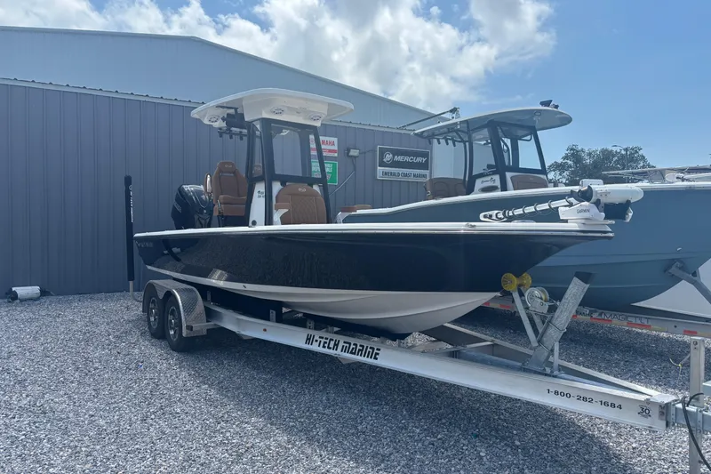 Slide: The Image of 2026 Key West 250 Bay Reef boat on trailer at dealership. - 4