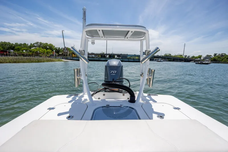 Slide: The Image of 2018 Bomb Island 160 SC boat on water, featuring a 70 HP engine. - 10