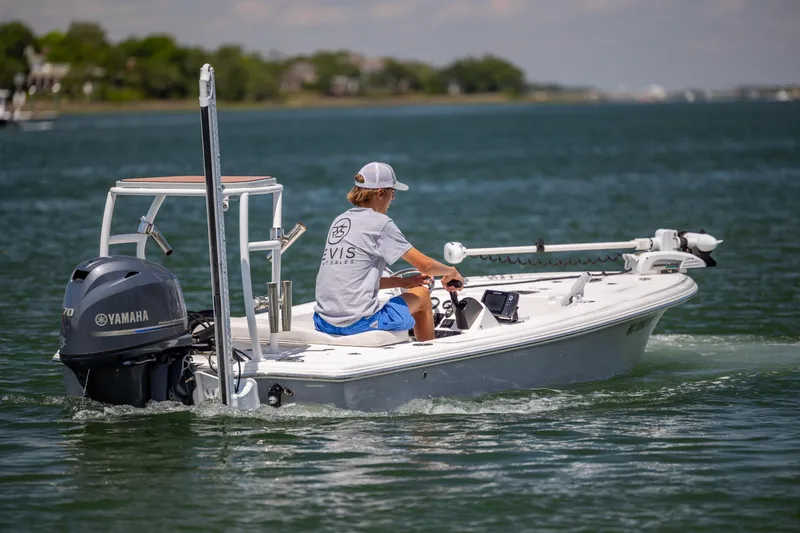 Slide: The Image of 2018 Bomb Island 160 SC boat with Yamaha engine on a calm lake. - 4
