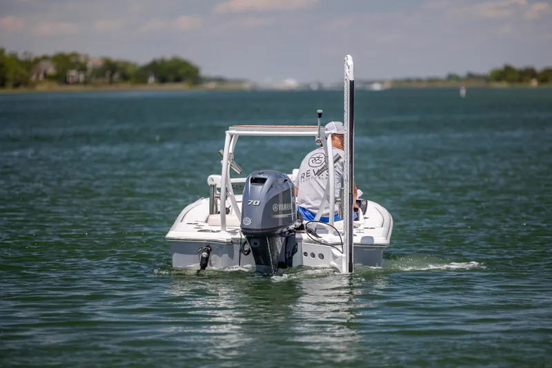 Slide: The Image of 2018 Bomb Island 160 SC boat cruising on a calm lake with a Yamaha engine. - 5