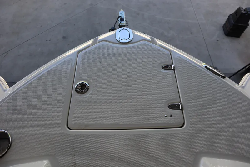 Slide: The Image of Bow view of 2009 Chaparral Sunesta 244 boat, featuring deck hatch and fittings. - 4