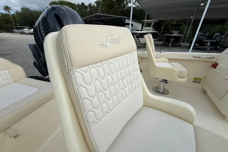 Slide: The Image of 2026 Scout 188 Sport Dorado boat interior with luxurious seating and Yamaha engine. - 6