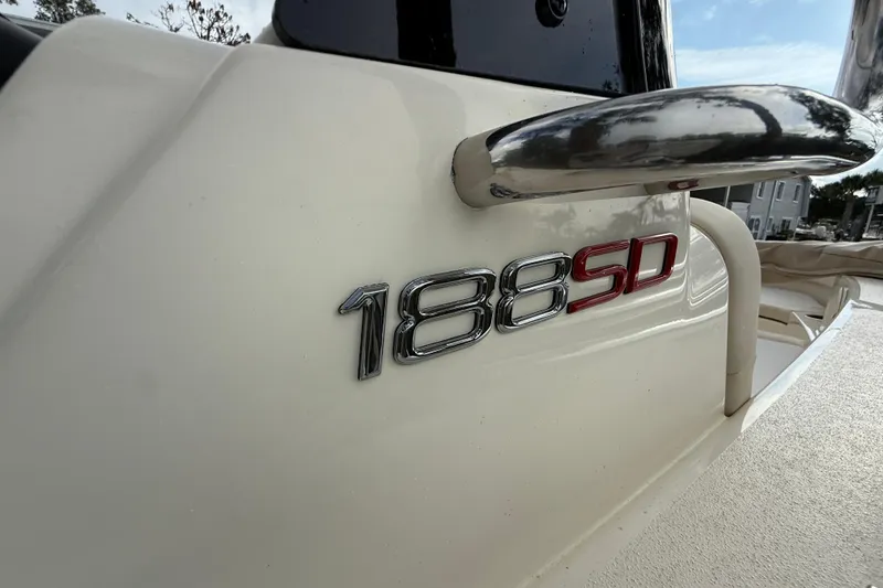 Slide: The Image of 2026 Scout 188 Sport Dorado boat emblem close-up, showcasing model details. - 7