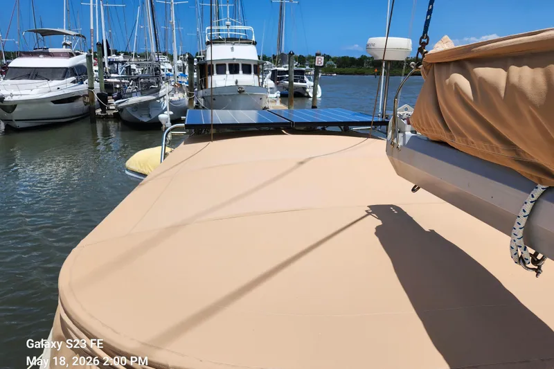 Slide: The Image of Beneteau Idylle 15.50 sailboat docked at marina, sunny day, 1986 model. - 30
