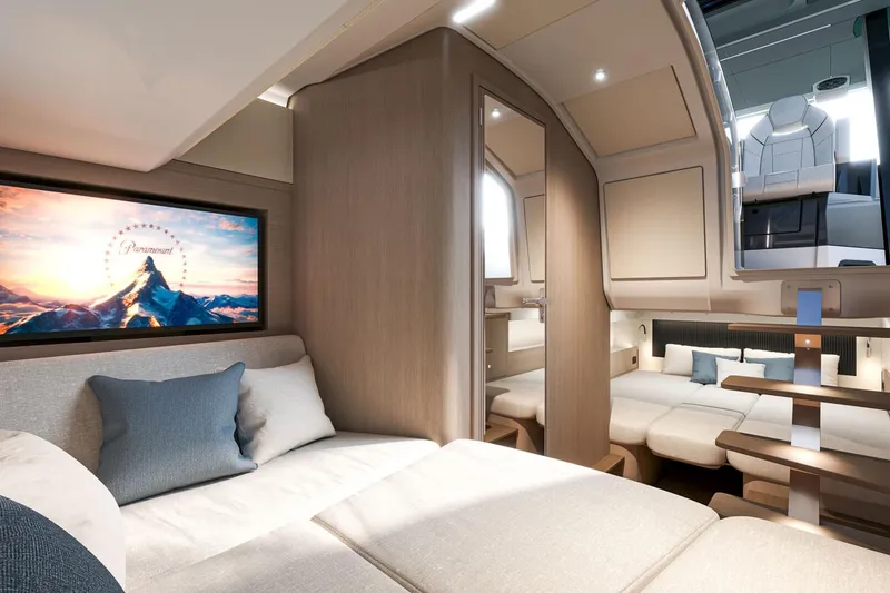 Slide: The Image of Luxurious interior of 2026 Beneteau Grand Turismo 35 yacht with modern seating and entertainment system. - 13
