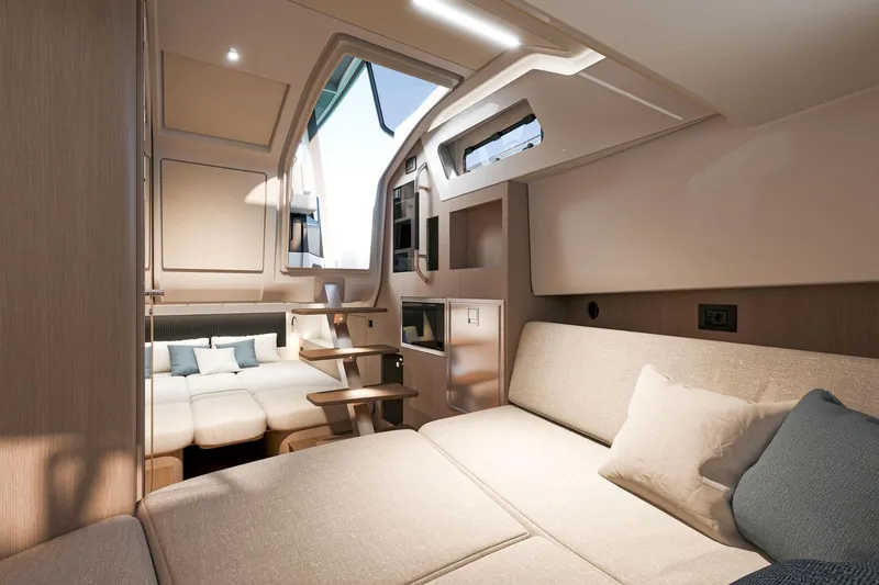 Slide: The Image of Interior of 2026 Beneteau Grand Turismo 35 yacht, featuring modern seating and natural light. - 14