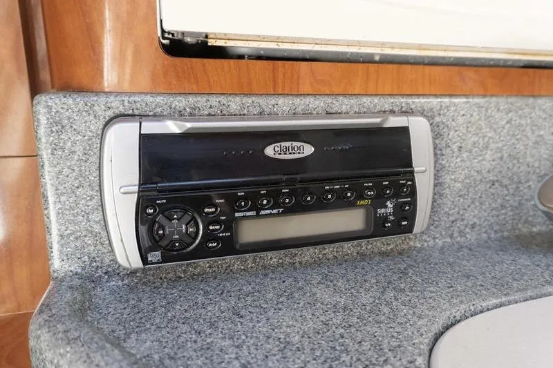 Slide: The Image of Clarion stereo system in 2005 Larson Cabrio 290 boat interior. - 18