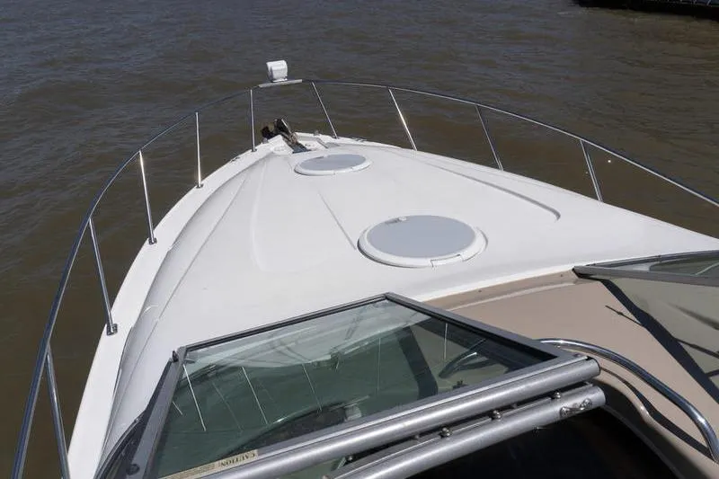 Slide: The Image of 2005 Larson Cabrio 290 boat deck with open water view. - 22