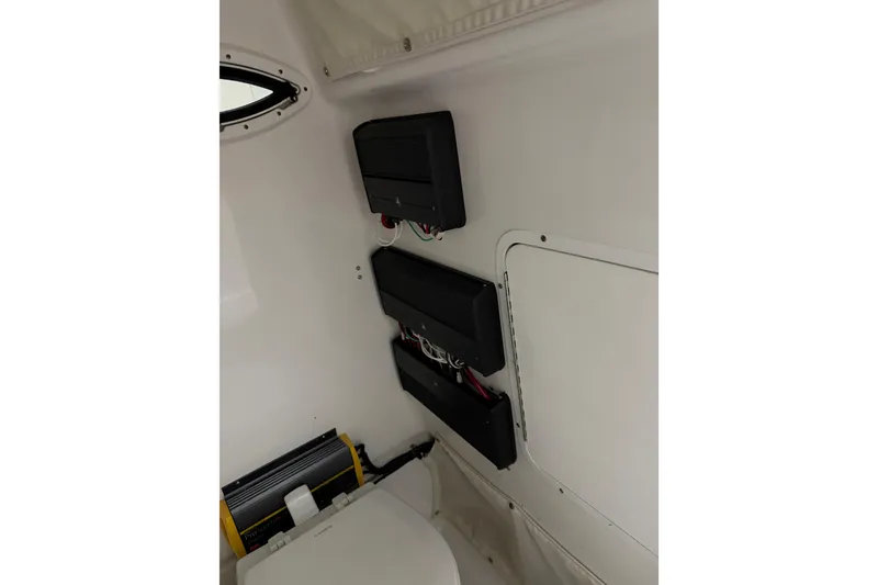 Slide: The Image of 2019 Sea Hunt Gamefish 25 interior wiring and equipment setup. - 13