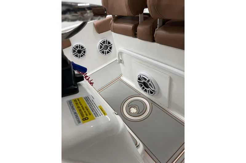 Slide: The Image of 2019 Sea Hunt Gamefish 25 interior with speakers and seating. - 16