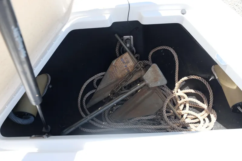 Slide: The Image of Boat storage compartment with ropes and anchors, Cobalt 200, 2004 model. - 14