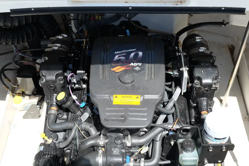 Slide: The Image of Engine compartment of a 2004 Cobalt 200 with MerCruiser 5.0 MPI engine. - 27