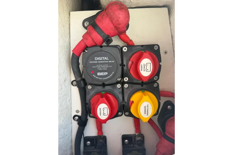 Slide: The Image of Electrical panel with digital voltage relay and switches on Solara S-250 CW, 2020 model. - 13