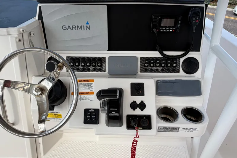 Slide: The Image of Control panel of 2020 Solara S-250 CW boat with Garmin navigation system. - 16