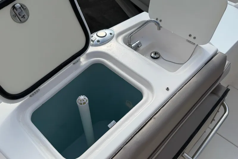 Slide: The Image of Livewell and sink on 2020 Solara S-250 CW boat deck. - 21