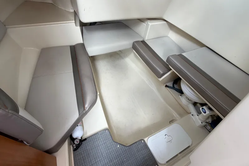 Slide: The Image of Interior cabin of 2020 Solara S-250 CW boat with seating and compact toilet. - 25