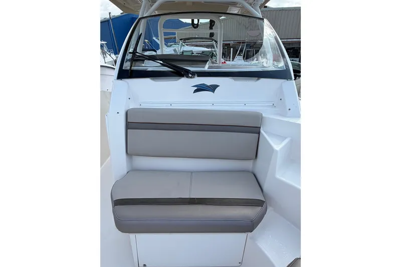 Slide: The Image of 2020 Solara S-250 CW boat interior with cushioned seating and windshield. - 31