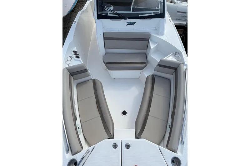 Slide: The Image of 2020 Solara S-250 CW boat interior with cushioned seating and cup holders. - 32