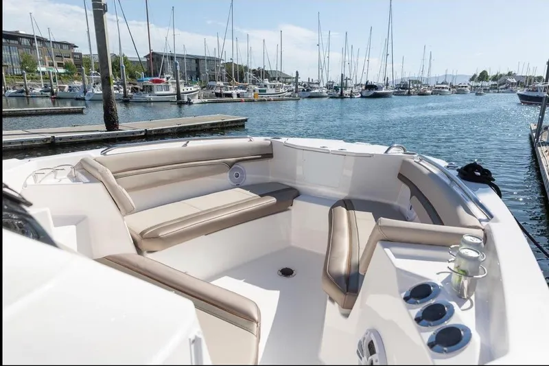 Slide: The Image of Luxurious 2020 Solara S-250 CW boat interior with comfortable seating at marina. - 34