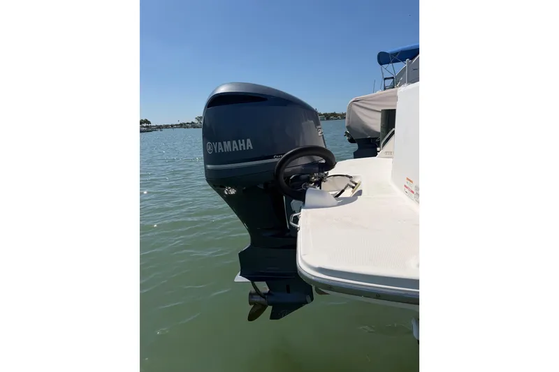 Slide: The Image of Outboard motor on Solara S-250 CW boat, 2020 model, in calm waters. - 4