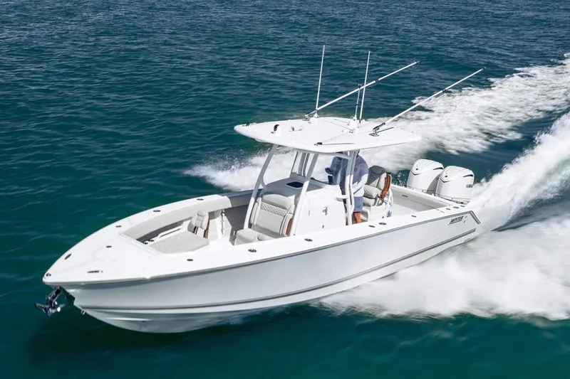 The Image of Manufacturer Provided Image: 2026 Jupiter 30 boat cruising on open water, showcasing sleek design and powerful engines. - 0