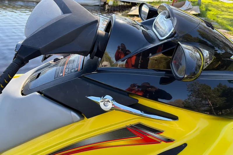 Slide: The Image of 2004 Sea-Doo GTX 4-TEC Supercharged jet ski, yellow and black, close-up view. - 10