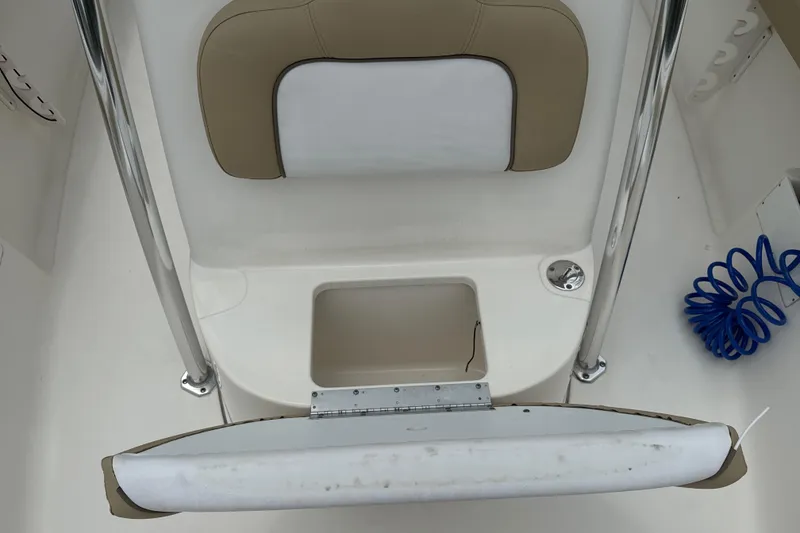Slide: The Image of 2014 Key West 239 FS boat interior with seating and storage compartment. - 36