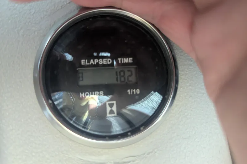 Slide: The Image of Elapsed time meter showing 18.2 hours on Trifecta 22RF LE, 2021 model. - 12