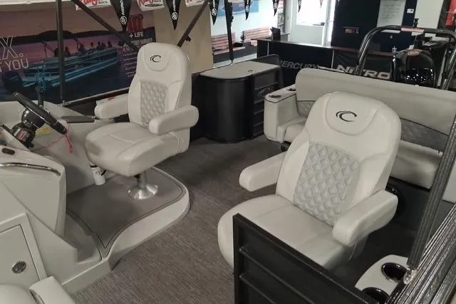 Slide: The Image of 2022 Crest Classic Platinum 220 boat interior with luxurious seating and modern design. - 14