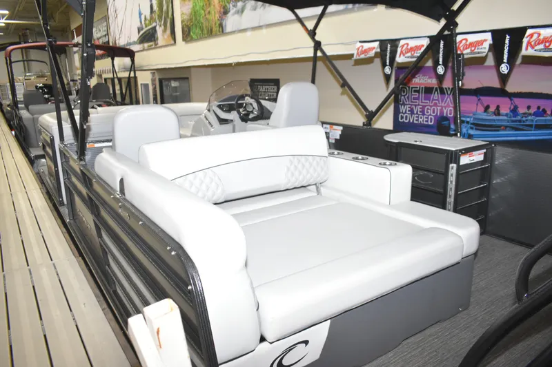 Slide: The Image of 2012 Crest 230 Prestige SLR pontoon boat with white seating and modern interior design. - 19