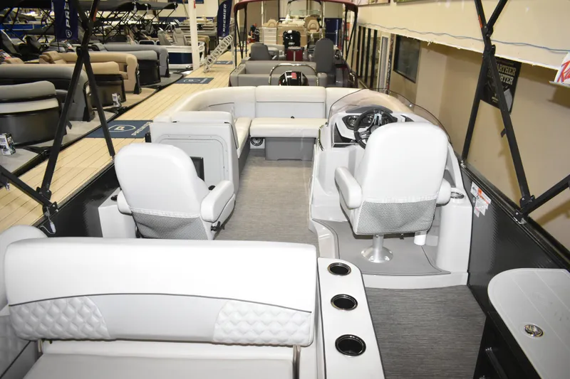 Slide: The Image of Interior view of a 2012 Crest 230 Prestige SLR pontoon boat with seating and helm. - 20