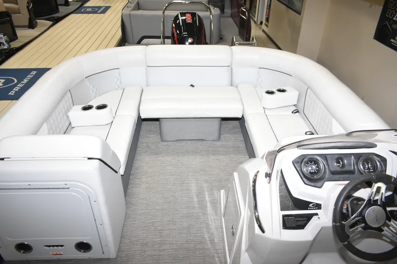 Slide: The Image of Luxurious interior of 2012 Crest 230 Prestige SLR pontoon boat with plush seating. - 21
