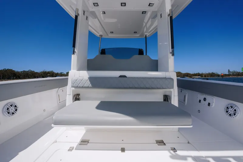Slide: The Image of Schaefer V33SF 2027 boat interior with seating area, blue sky. - 12