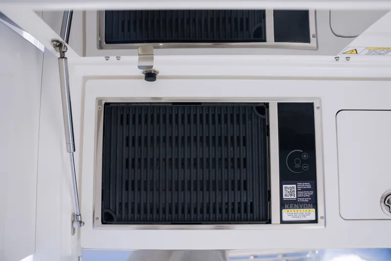 Slide: The Image of Schaefer V33SF 2027 boat kitchen with Kenyon grill. - 14
