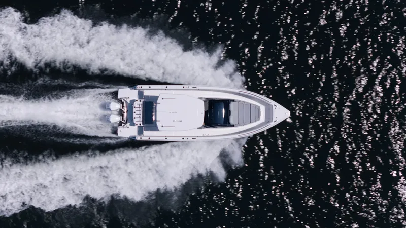 Slide: The Image of Aerial view of Schaefer V33SF yacht on water, 2027 model. - 3