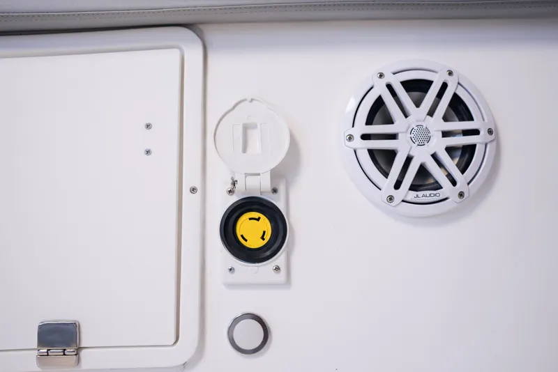 Slide: The Image of Schaefer V33SF 2027 boat features speaker and power outlet. - 32