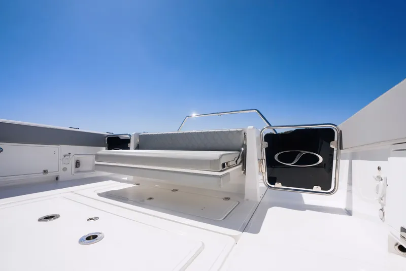 Slide: The Image of Schaefer V33SF 2027 boat with luxurious seating and blue sky. - 9