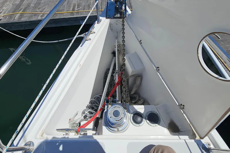 Slide: The Image of Anchor locker of a 2006 Catalina 42 MkII sailboat with chain and winch. - 10