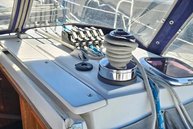 Slide: The Image of Close-up of a 2006 Catalina 42 MkII sailboat deck with winch and ropes. - 15