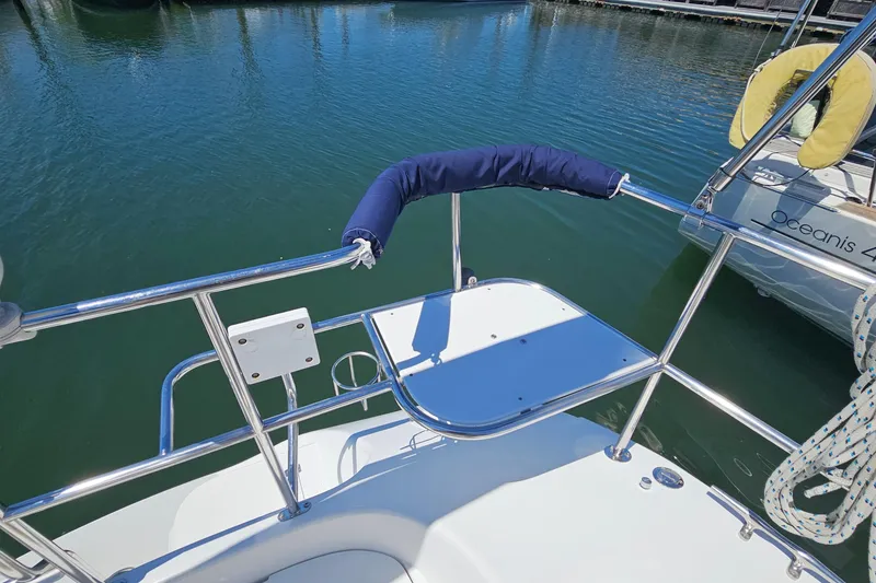 Slide: The Image of Catalina 42 MkII 2006 sailboat stern with stainless steel railings and padded guard. - 16