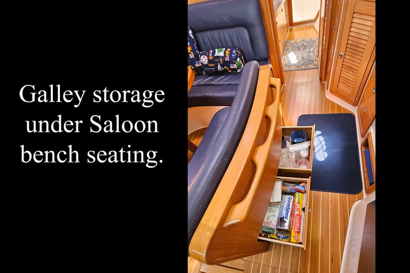 Slide: The Image of Galley storage under saloon bench seating in 2006 Catalina 42 MkII yacht. - 26