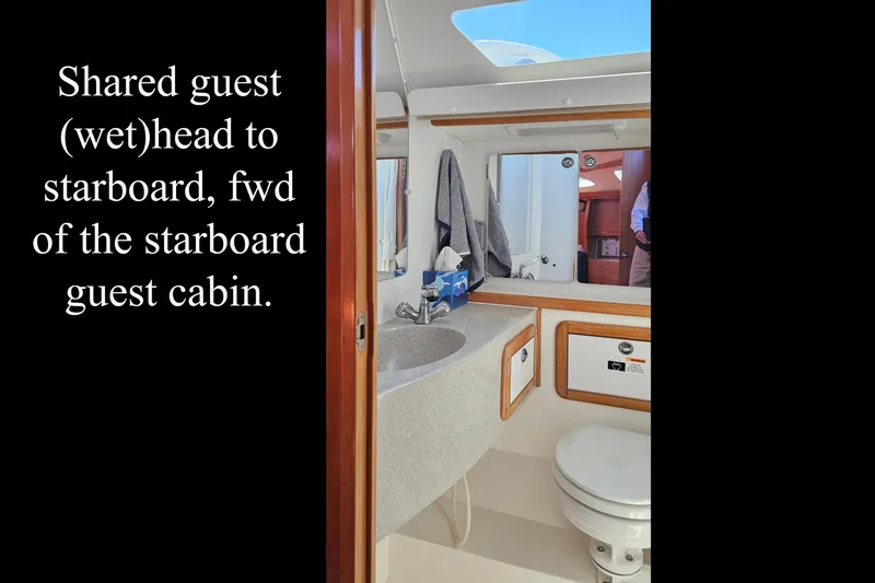 Slide: The Image of Shared guest wet head in 2006 Catalina 42 MkII, starboard side, forward of guest cabin. - 35