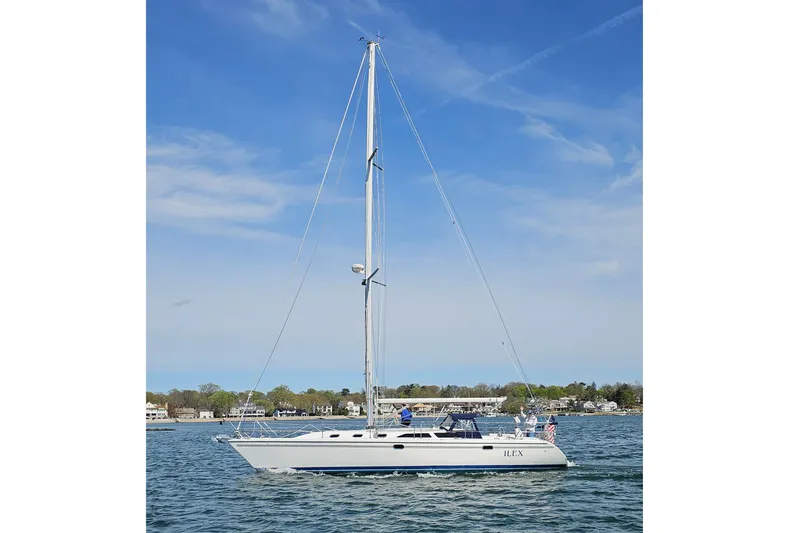 Slide: The Image of Sailing yacht Catalina 42 MkII 2006 on calm waters under a clear blue sky. - 4