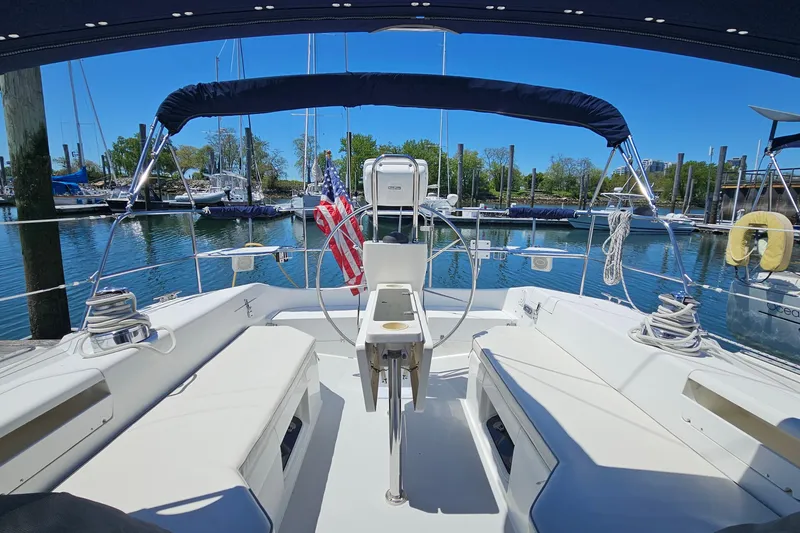 Slide: The Image of Cockpit view of a 2006 Catalina 42 MkII sailboat docked in a marina. - 8
