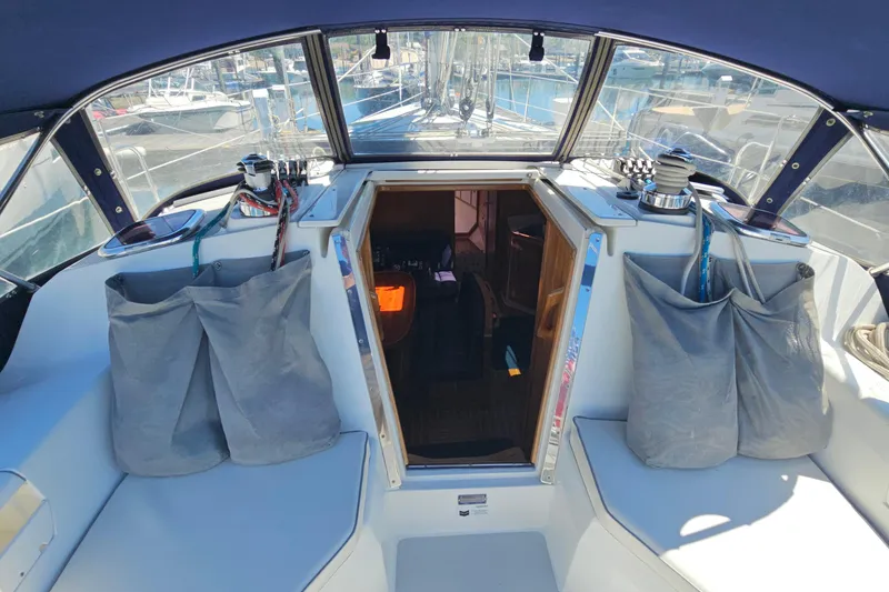 Slide: The Image of Cockpit view of 2006 Catalina 42 MkII sailboat with open cabin entrance. - 9