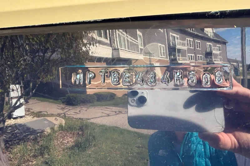 Slide: The Image of Hull identification number on a 2006 Mainship Pilot 34 Sedan boat. - 13