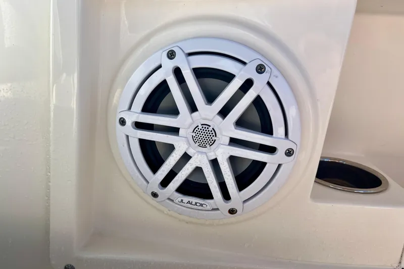 Slide: The Image of Speaker on 2023 Cobia 220 Dual Console boat, featuring JL Audio design. - 21