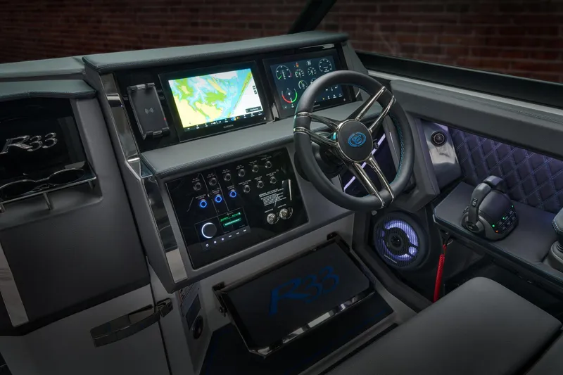 Slide: The Image of Manufacturer Provided Image: Interior of 2025 Cobalt R33 Surf boat with advanced navigation and control systems. - 27