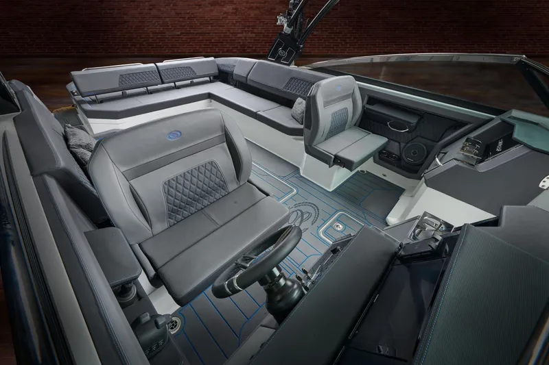Slide: The Image of Manufacturer Provided Image: 2025 Cobalt R33 Surf boat interior with luxurious seating and modern design. - 30
