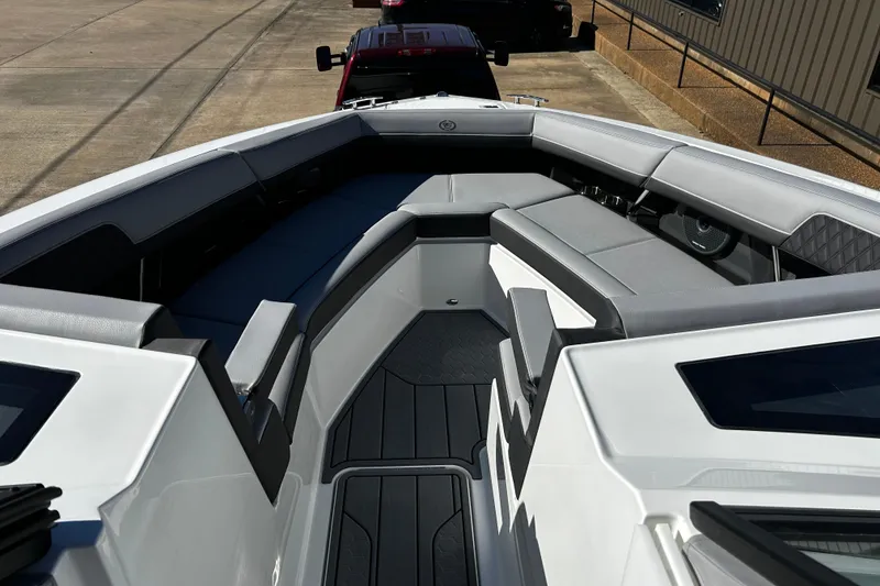 Slide: The Image of 2025 Cobalt R33 Surf boat interior with sleek seating and modern design. - 7